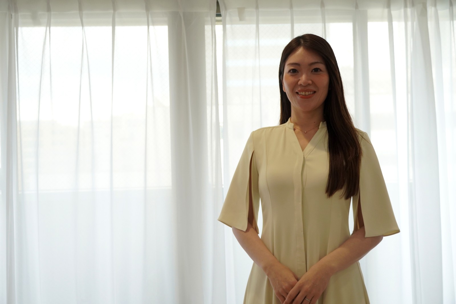笑顔で語る横幕真理さん
